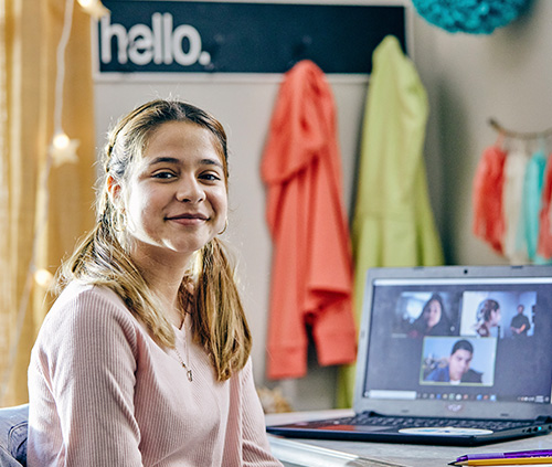 happy girl in virtual class