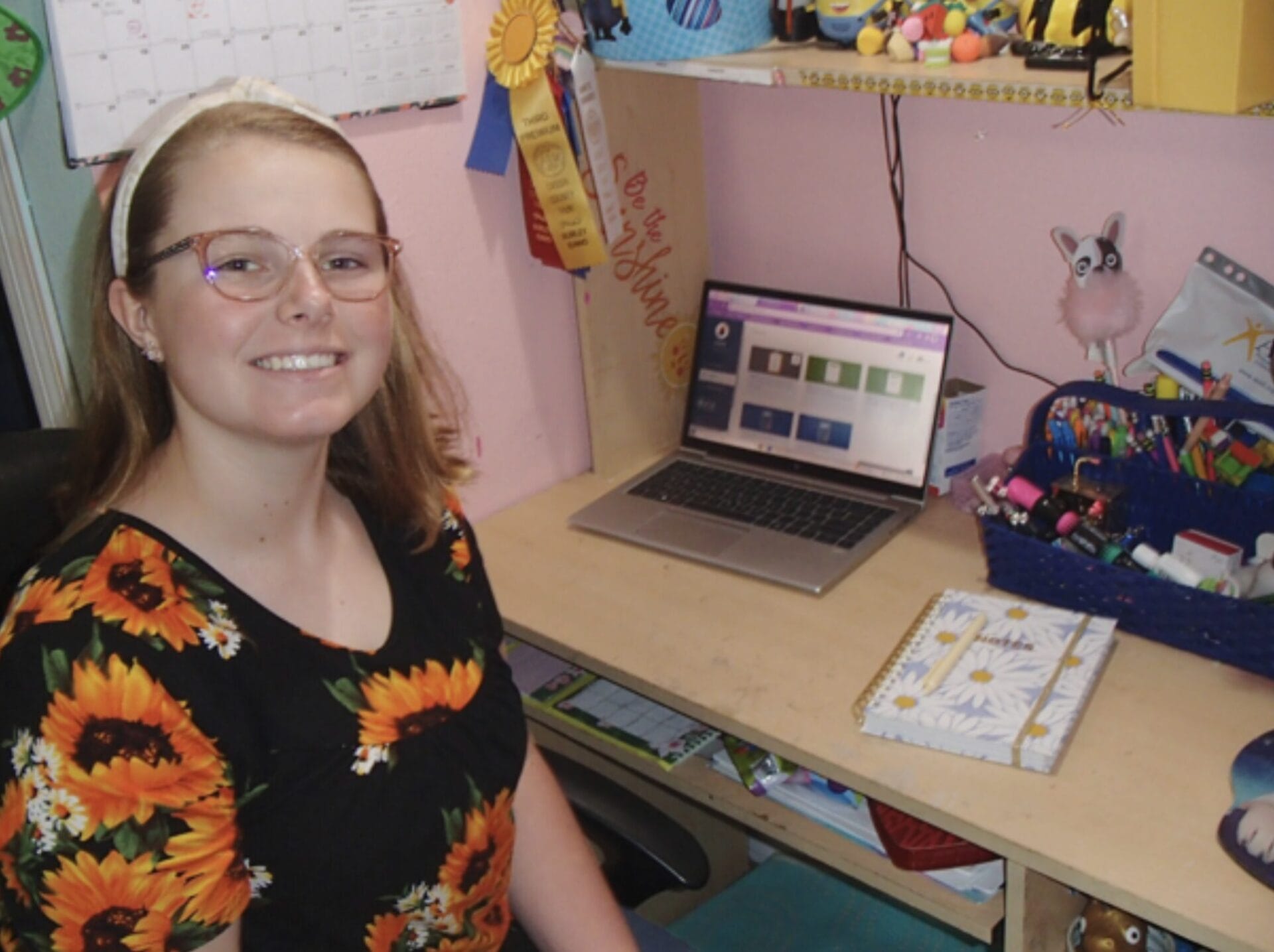 young man smiling in front of the camera